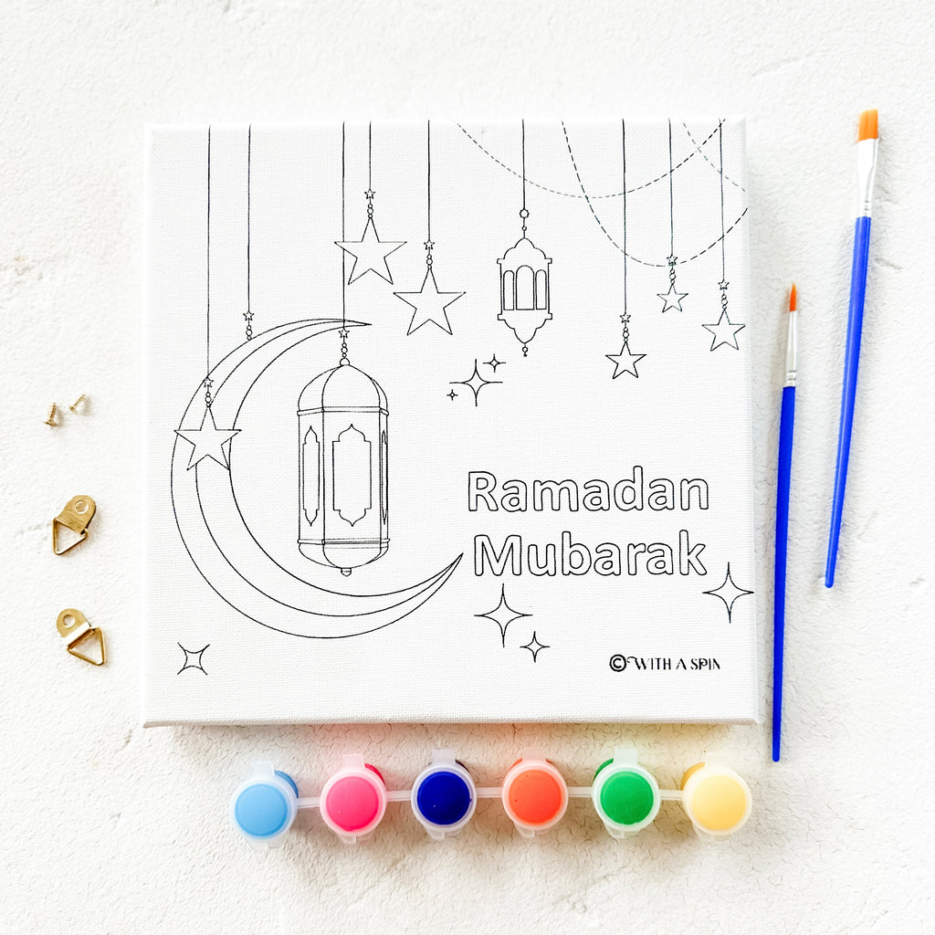 Ramadan DIY Canvas Painting Kit for kids featuring a canvas with crescent moon, star, and lantern designs, vibrant paint set, two paintbrushes, and wall hanging accessories—perfect for Islamic arts and crafts during Ramadan.